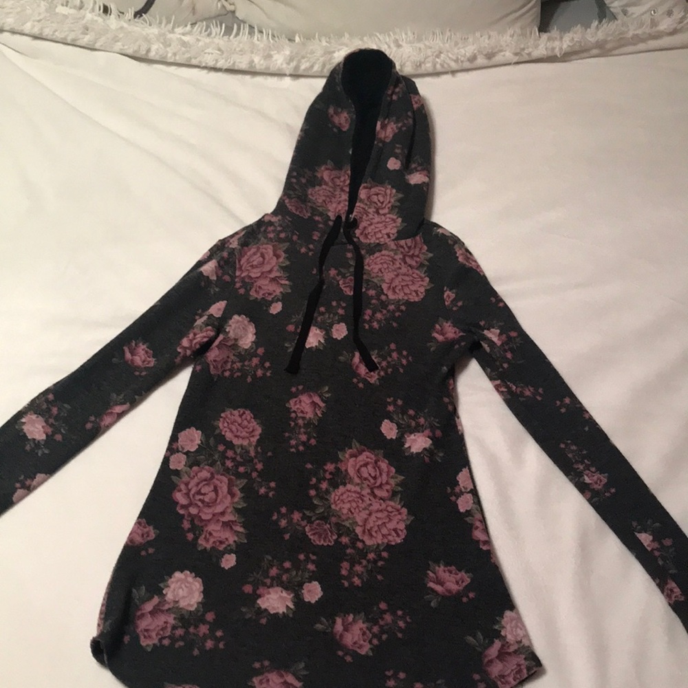 Ultra Flirt sweater with multicolor floral design.